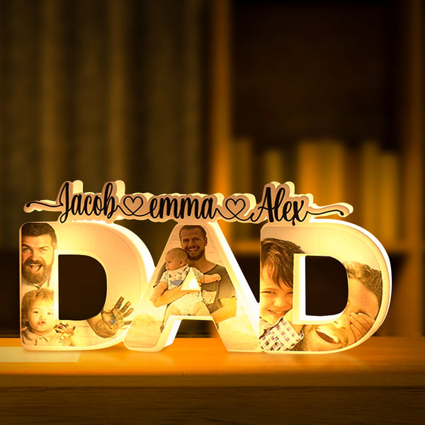 Personalized 'DAD' night lamp with family photo, a custom Father's Day gift, warm light, acrylic material.